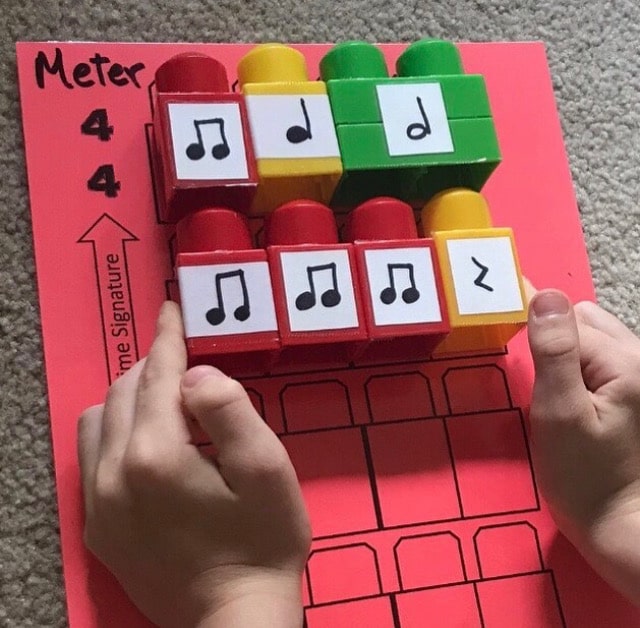 Child Creating Music Composition Using Rhythm Blocks and a Template