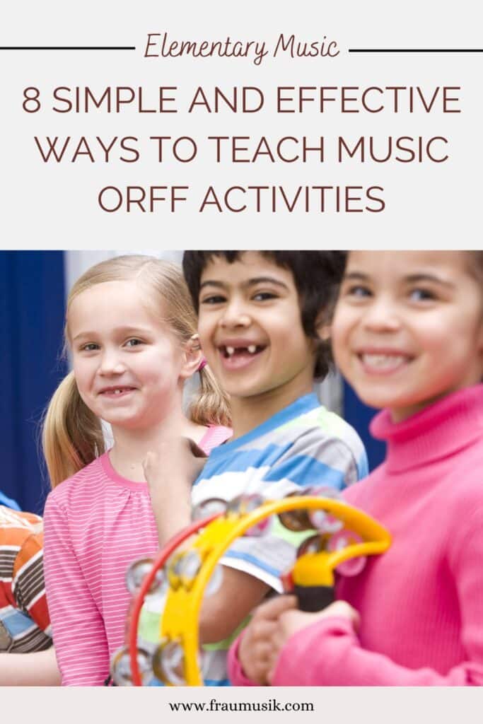 Elementary-age students play classroom music instruments