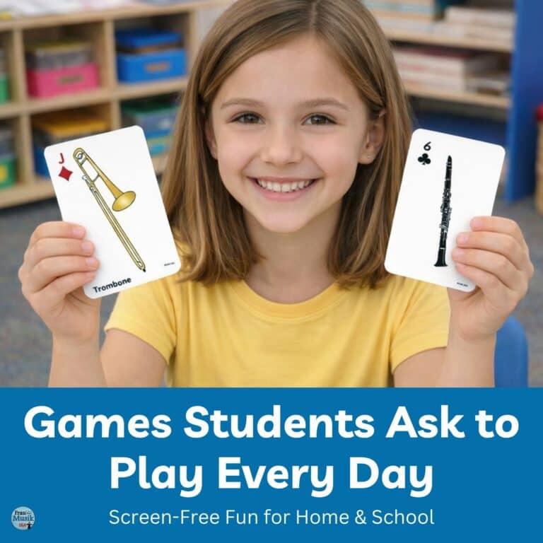 Girl in elementary music classroom. She is holding up musical instrument cards of a trombone and a clarinet.